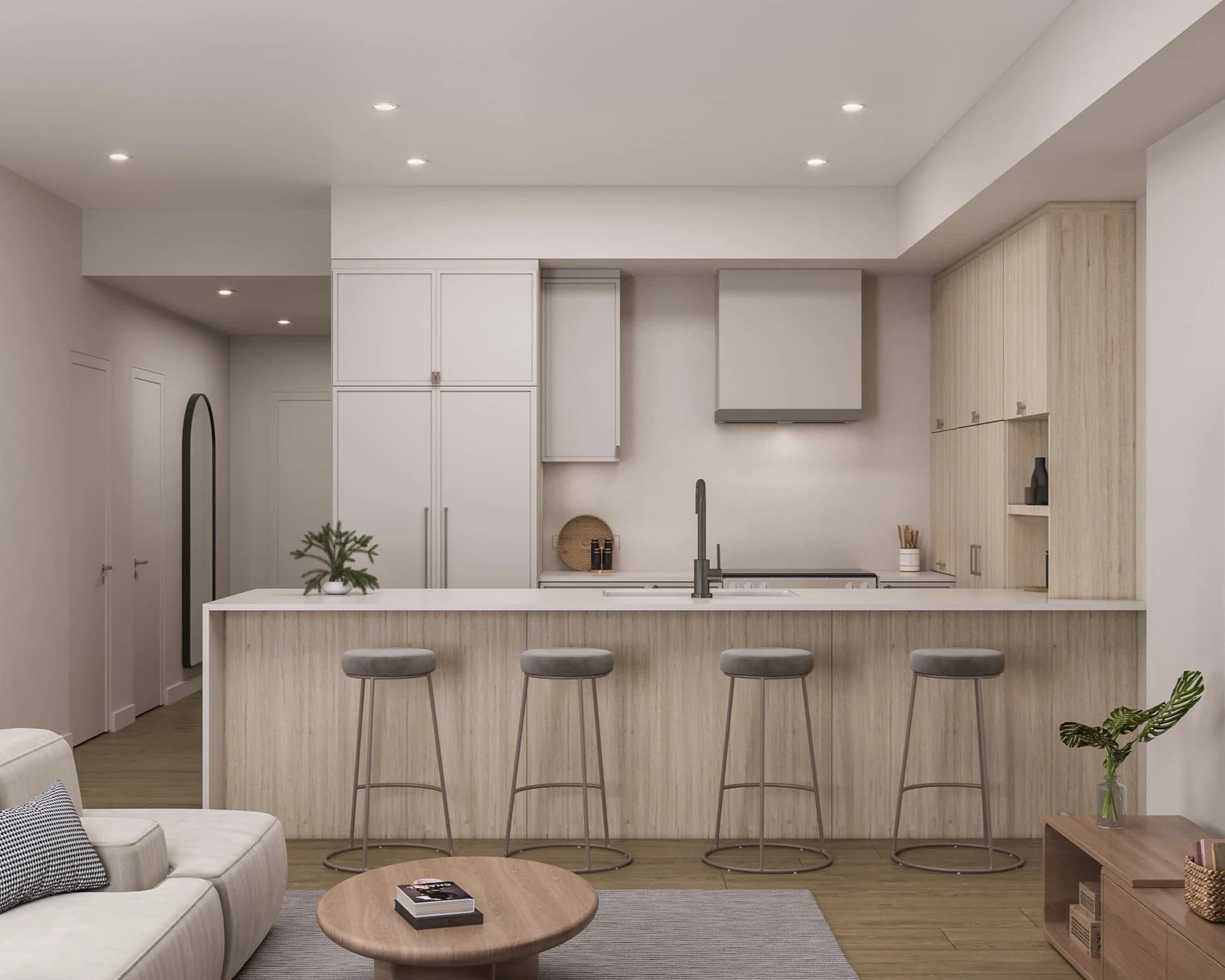 Bright open-concept kitchen interior in a new Kelowna condo, light cabinetry and full-height windows